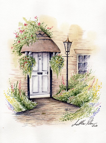 A thatched cottage and garden